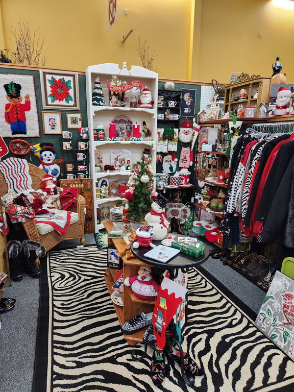 Christmas consignment booth at Apple Annie Antique Gallery