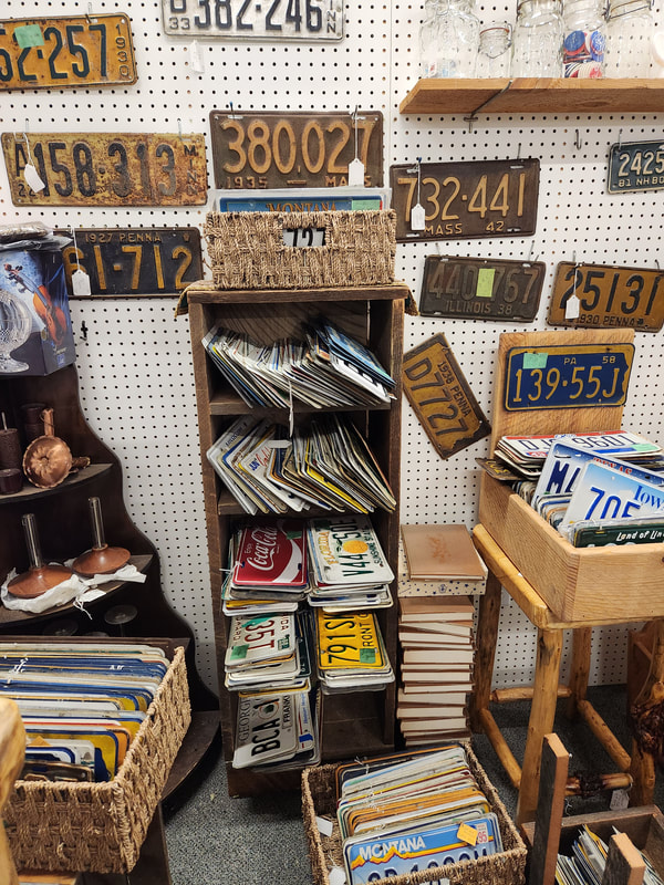 Vintage license plates Consignment booth at Apple Annie Antique Gallery