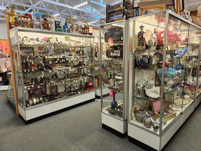 Collectible display cases at Apple Annie Antique Gallery