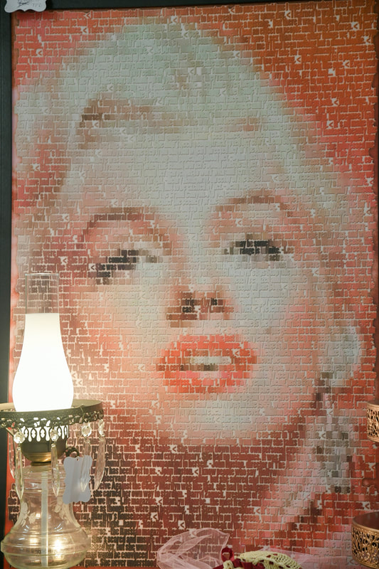 Antique mosaic artwork from one of the booths in our showroom