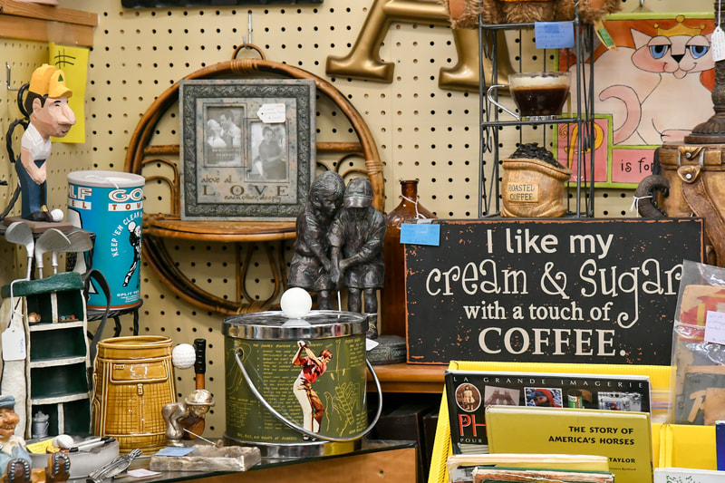 Antique signs and collectibles from one of the booths in our showroom