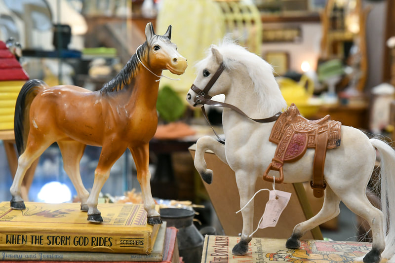 Antique horse collectibles from one of the booths in our showroom