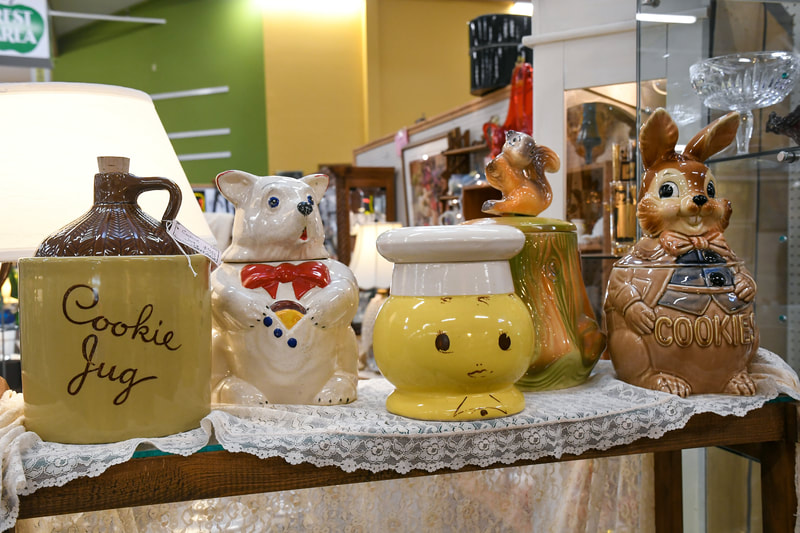 Antique kitchen canisters from one of the booths in our showroom