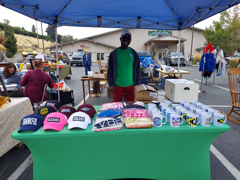 custom hats and coffee mugs from a vendor at the Apple Annie semi-annual flea market