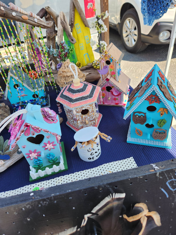 Handmade bird houses made by a vendor at our Cashmere flea market